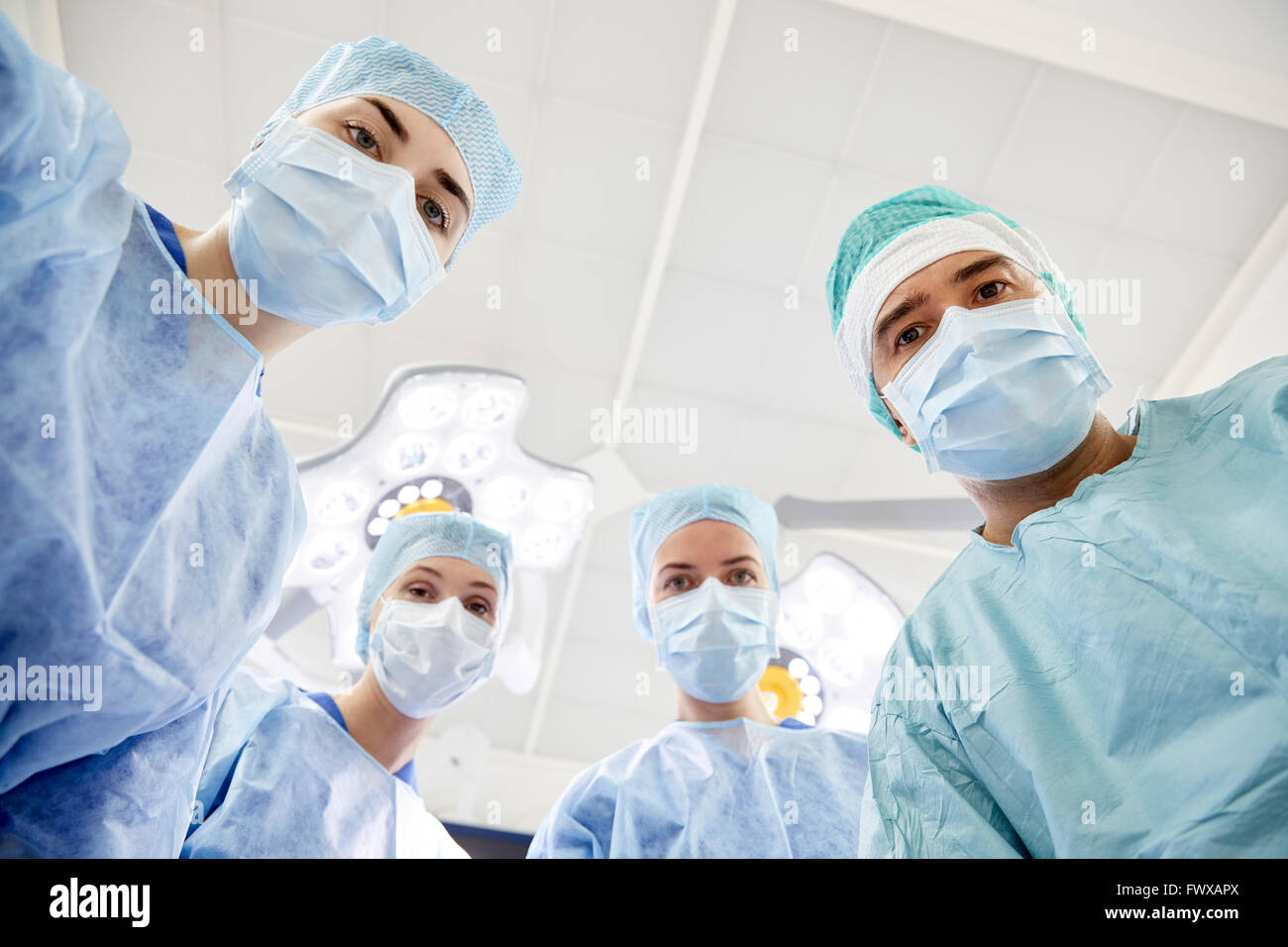 group of surgeons in operating room at hospital Stock Photo - Alamy