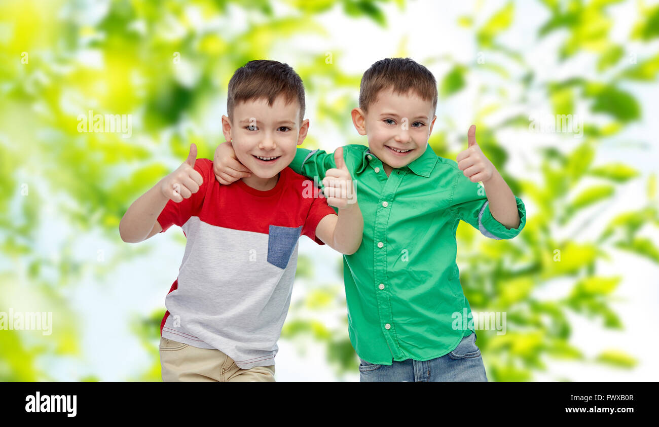 happy smiling little boys showing thumbs up Stock Photo - Alamy