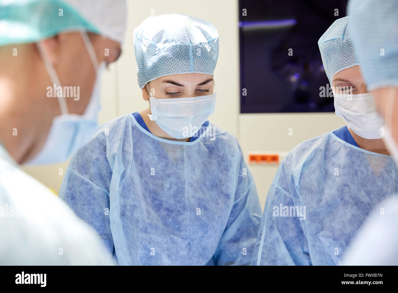 group of surgeons in operating room at hospital Stock Photo - Alamy
