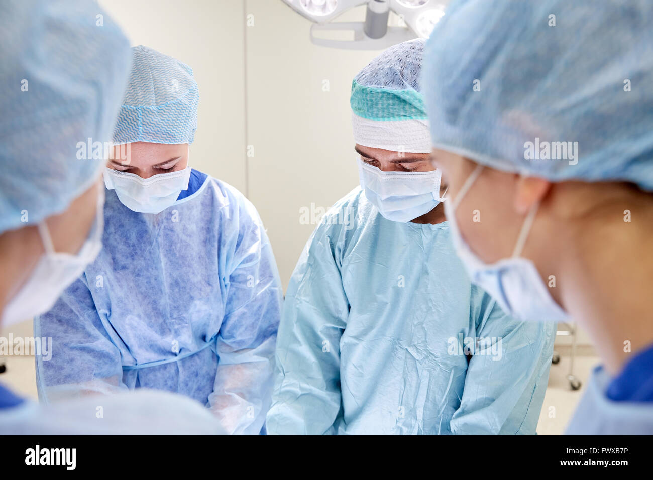 group of surgeons in operating room at hospital Stock Photo - Alamy