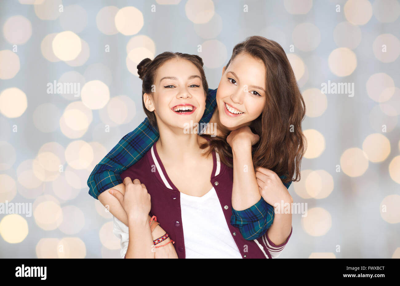 happy smiling pretty teenage girls hugging Stock Photo - Alamy