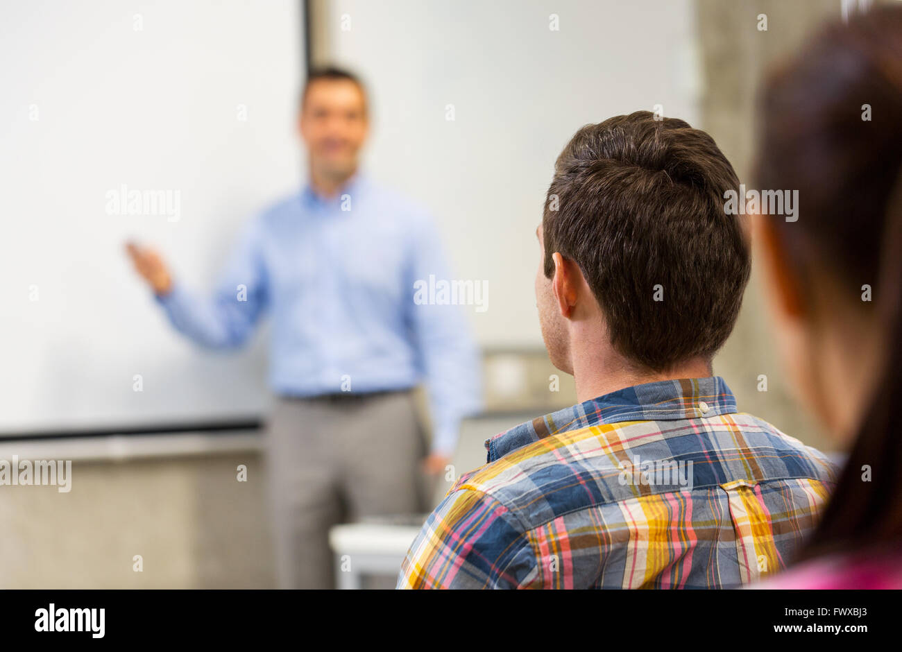 group of students and teacher in classroom Stock Photo Alamy