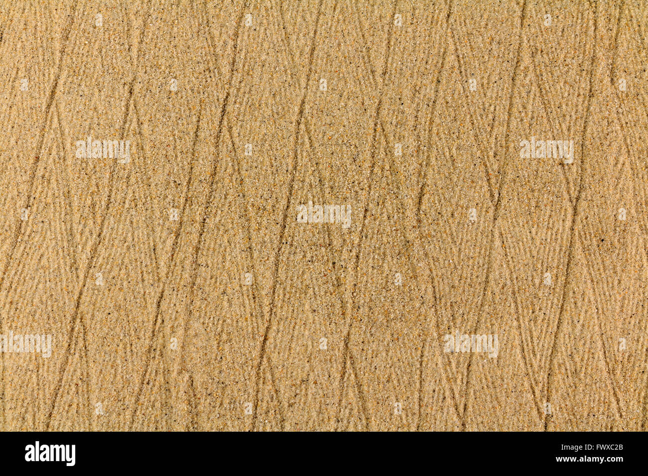 Macro of pattern in dry sand Stock Photo