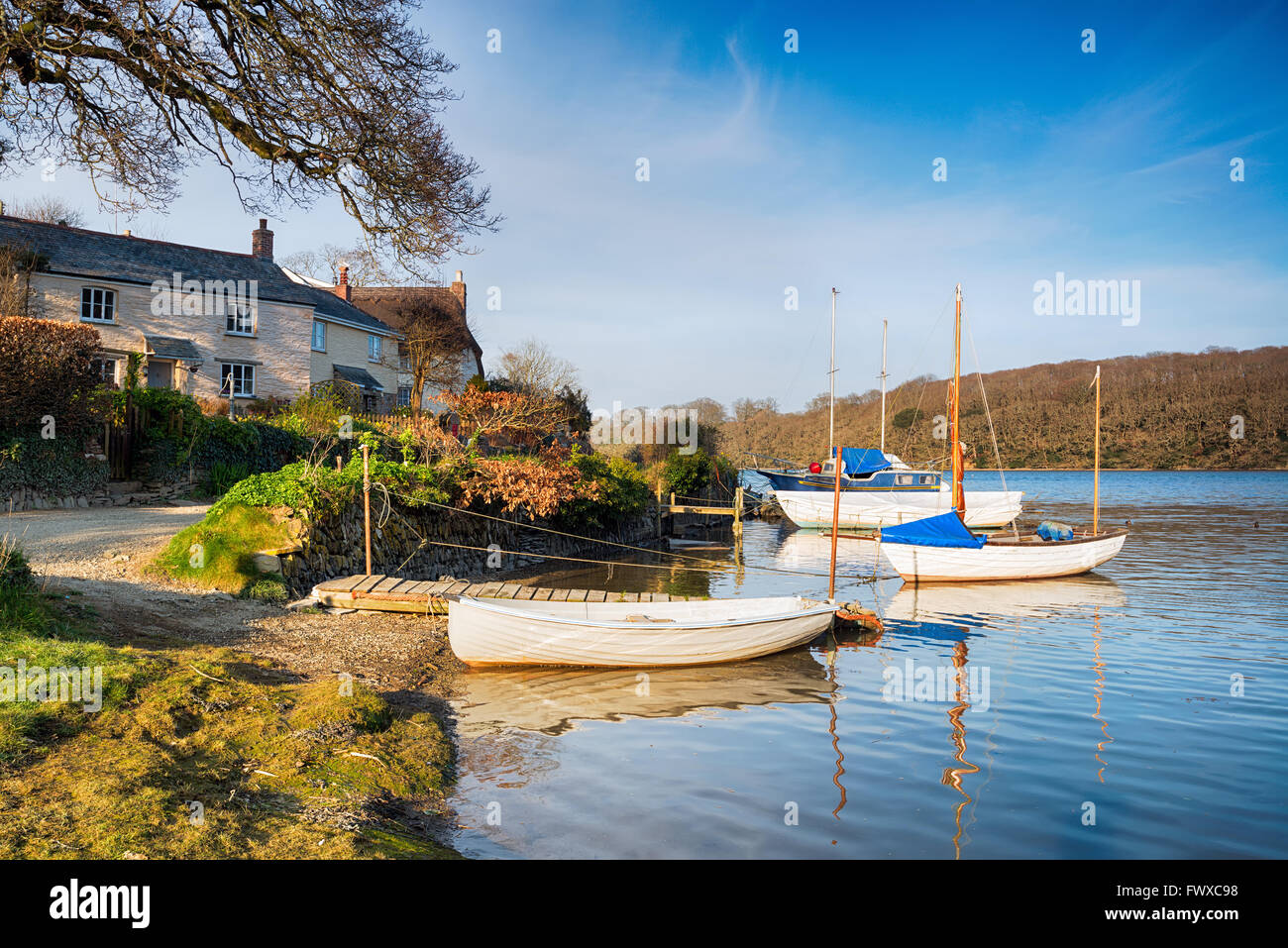 Boats on the shore at St Clement near Truro in Cornwall Stock Photo