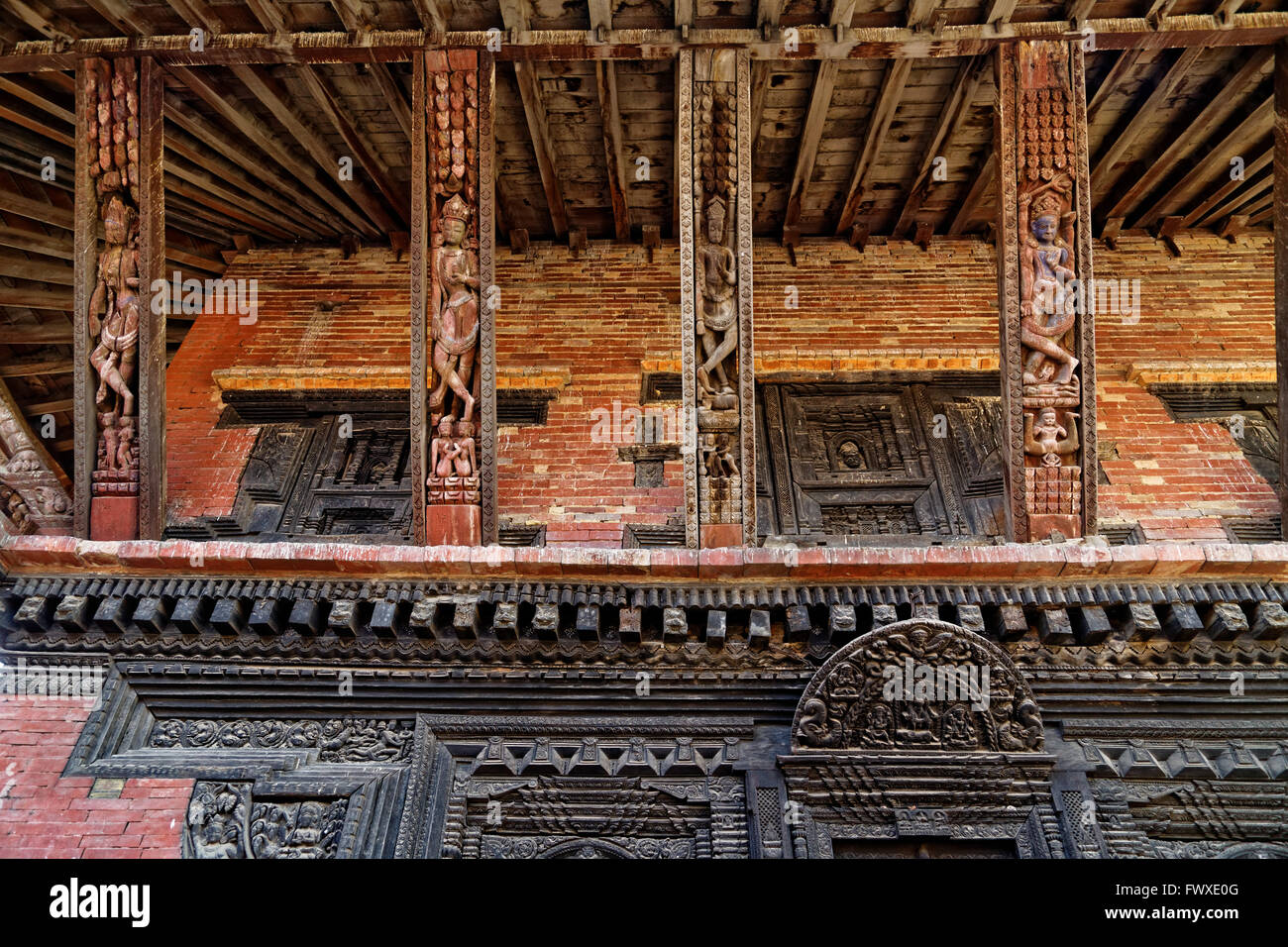Wooden rafter and door in temple of Bhaktapur, Kathmandu Valley, Nepal Stock Photo