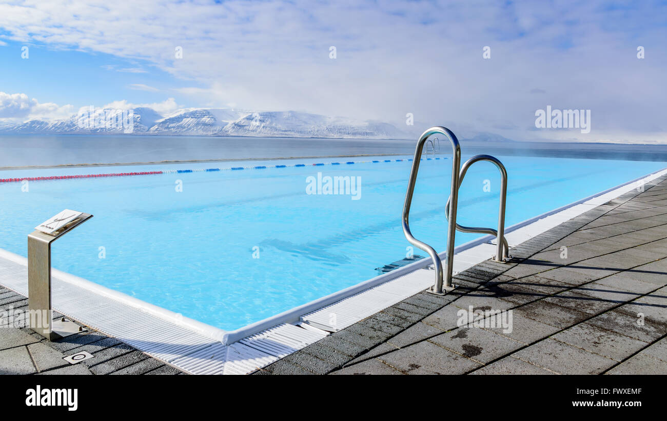 Infinity pool overlooking fjord in Hofsos, Iceland Stock Photo