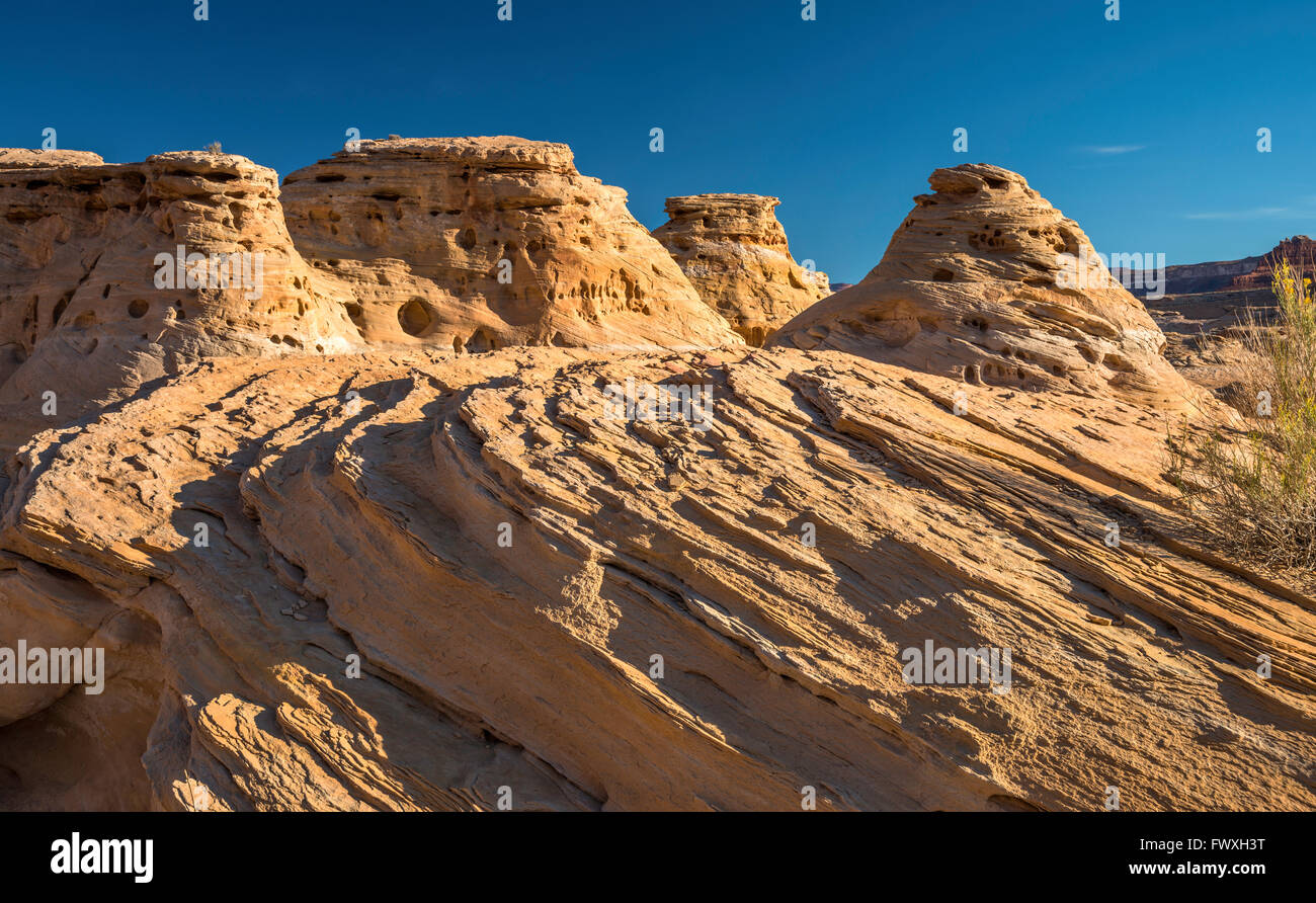 Sandstone slickrock formations over Dirty Devil River, Glen Canyon National Recreation Area, Utah, USA Stock Photo