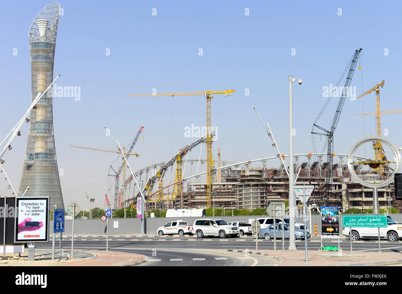 QATAR, Doha, construction site Khalifa International Stadium for FIFA world cup 2022, built by contractor midmac and sixt contract, left Aspire Tower / KATAR, Doha, Baustelle Khalifa International Stadium fuer die  FIFA Fussballweltmeisterschaft 2022 Stock Photo