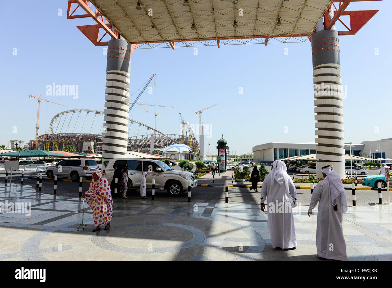 QATAR, Doha, Aspire Zone, gate of Villaggio Mall shopping mall, construction site Khalifa International Stadium for FIFA world cup 2022, built by contractor midmac and sixt contract / KATAR, Doha, Baustelle Khalifa International Stadium fuer die  FIFA Fussballweltmeisterschaft 2022 Stock Photo