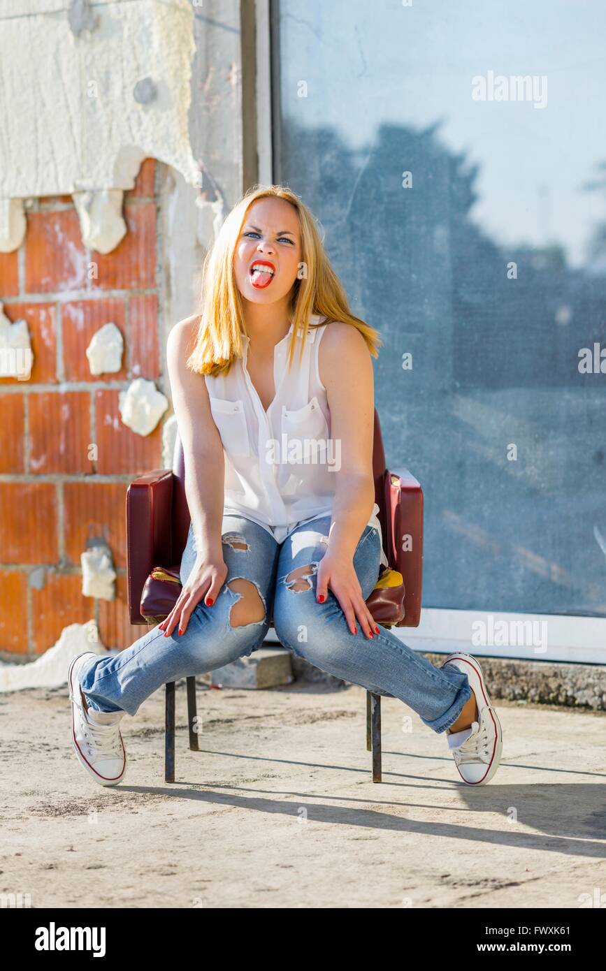 Girl Next Door In Denims And Sneakers Showing Tongue Rude Denim