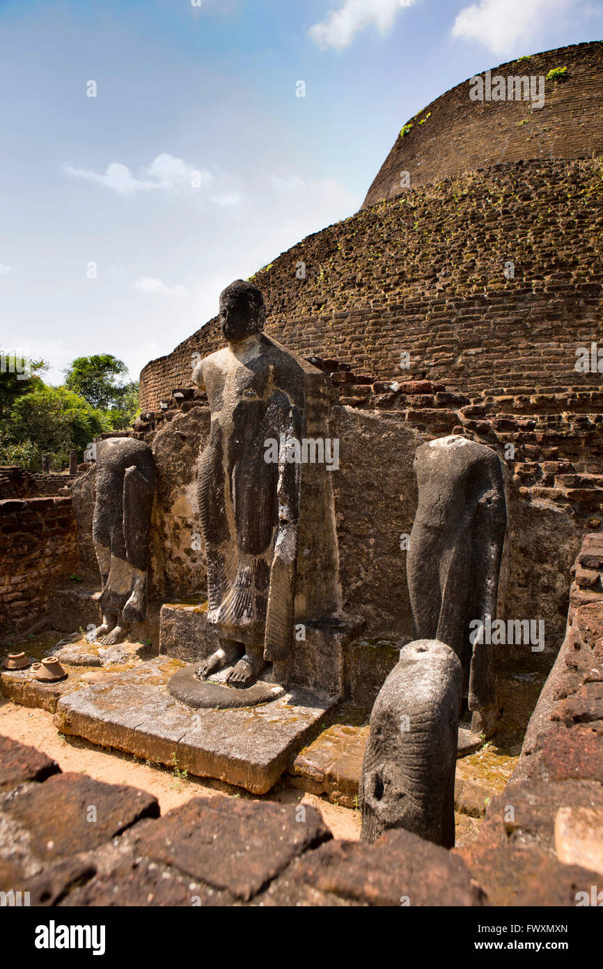 Sri Lanka, Polonnaruwa, Pabula Vihara, armless Buddha Statues in devotional niche Stock Photo