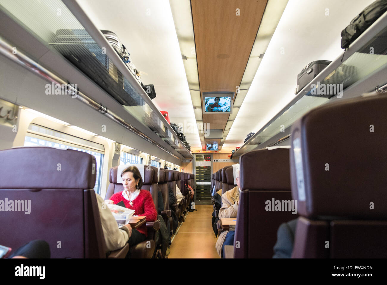 First class carriage of Spanish Railways RENFRE train heading from Toulouse,France to Atocha train station Madrid. Stock Photo
