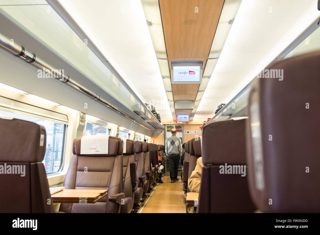 First class carriage of Spanish Railways RENFRE train heading from Toulouse,France to Atocha train station Madrid. Stock Photo