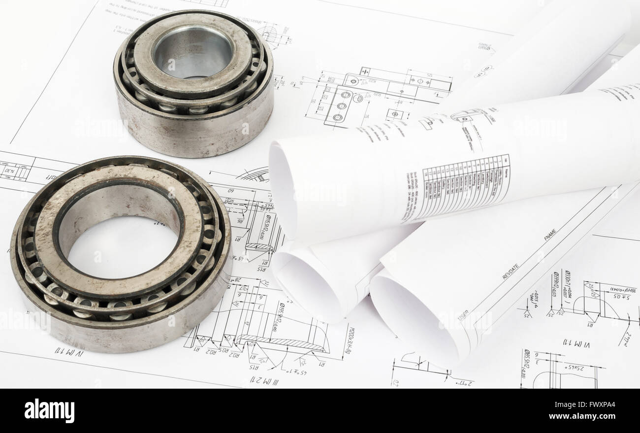 Architecture plan and rolls of blueprints Stock Photo - Alamy