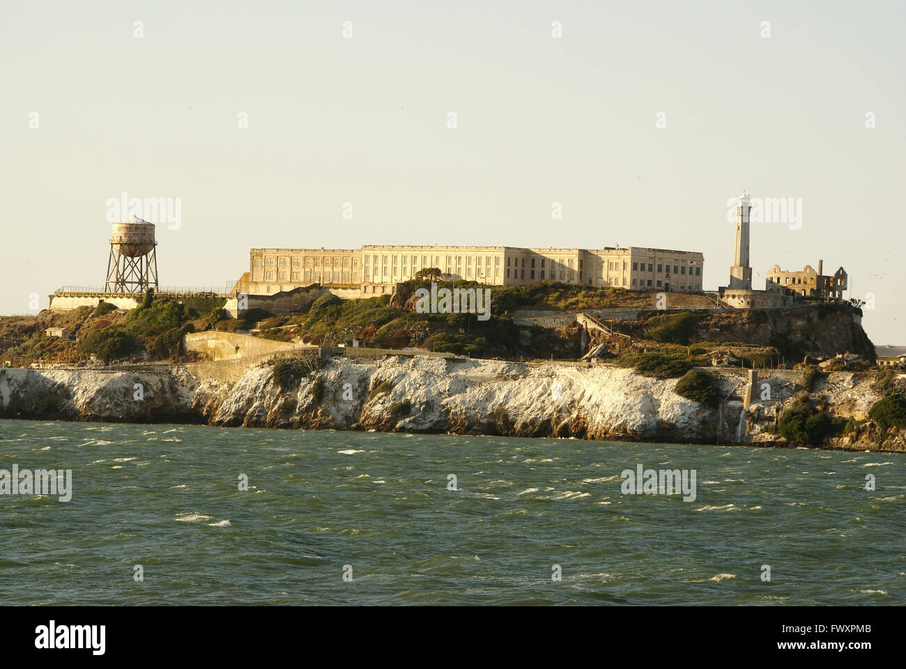 Alcatraz Island, offshore San Francisco Bay, California, USA, with a lighthouse, military fortification and Army prison Stock Photo