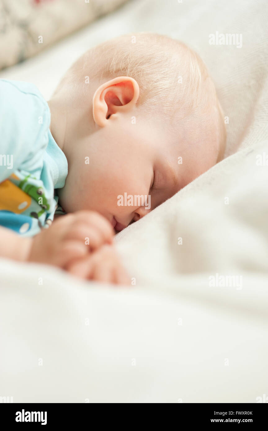 Sweden, Portrait of baby girl (23) sleeping Stock Photo Alamy