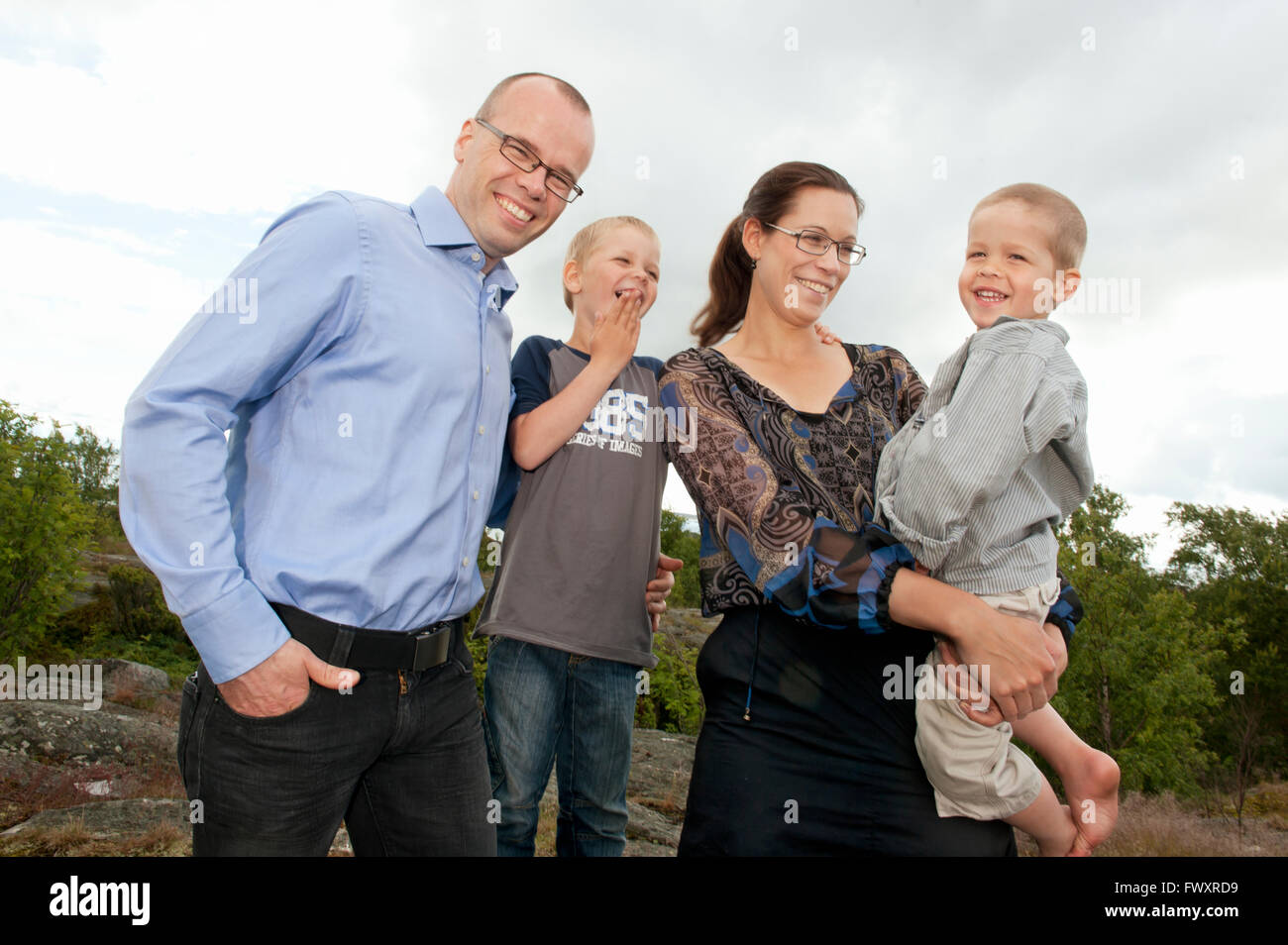 Sweden, Vastra Gotaland, Torslanda, Portrait of family with two children (4-5) Stock Photo
