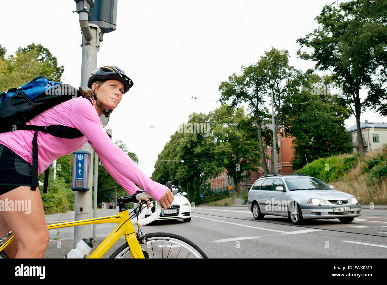 Woman cycling urban helmet hi-res stock photography and images - Alamy