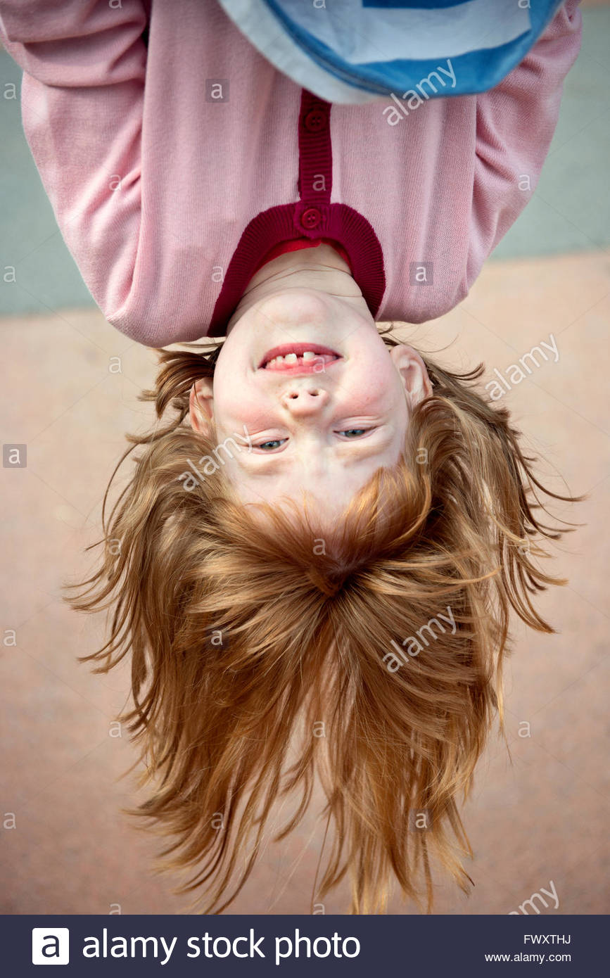 Sweden Redhead Girl 4 5 Hanging Upside Down Stock Photo