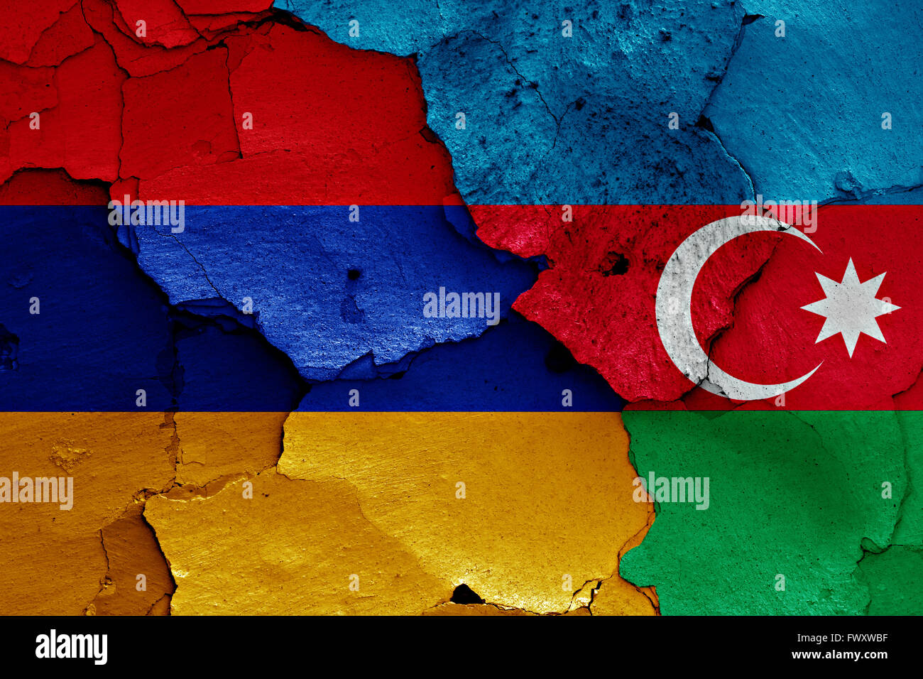 flags of Armenia and Azerbaijan painted on cracked wall Stock Photo
