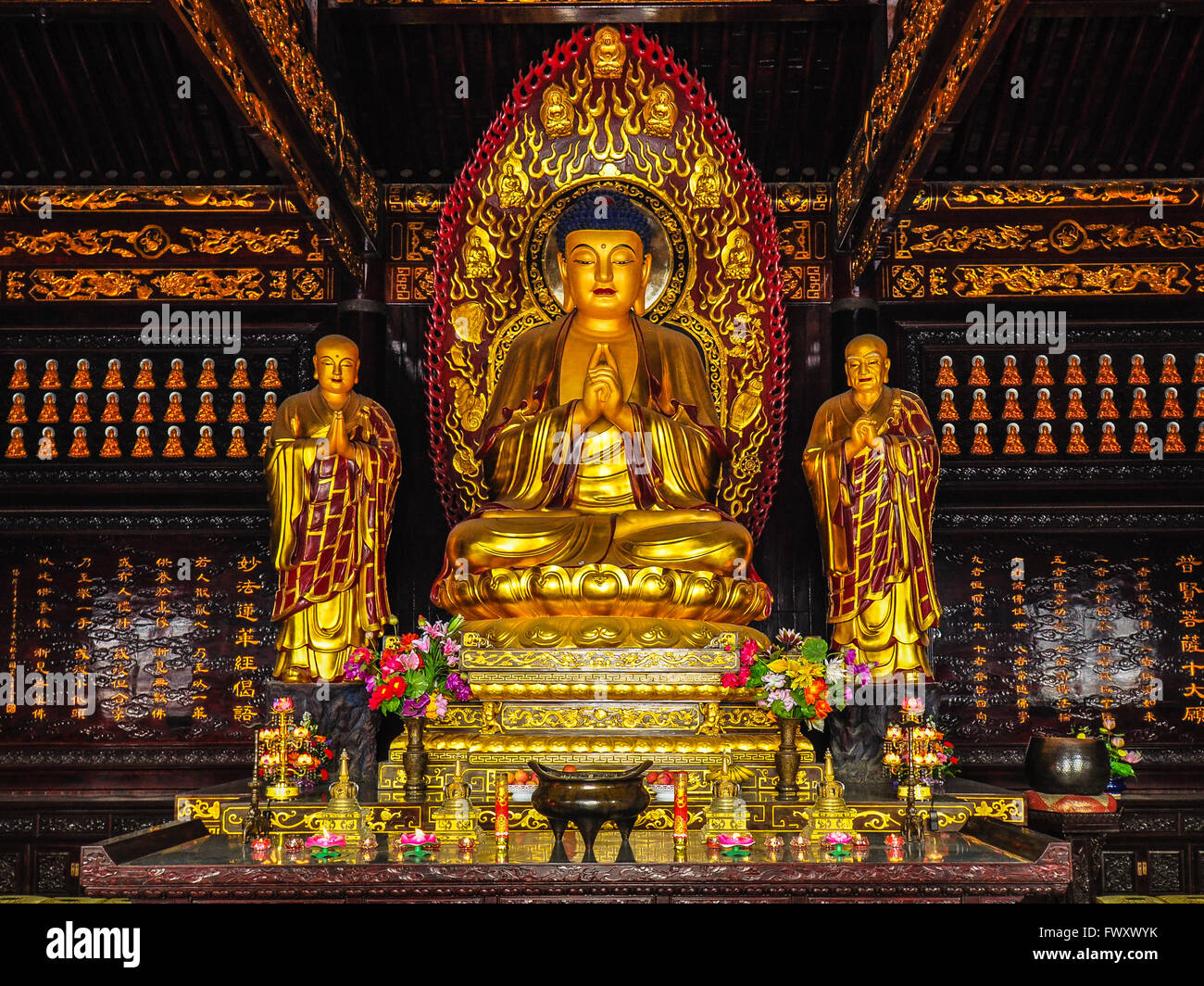 Golden Buddha and Disciples - Xian, China Stock Photo