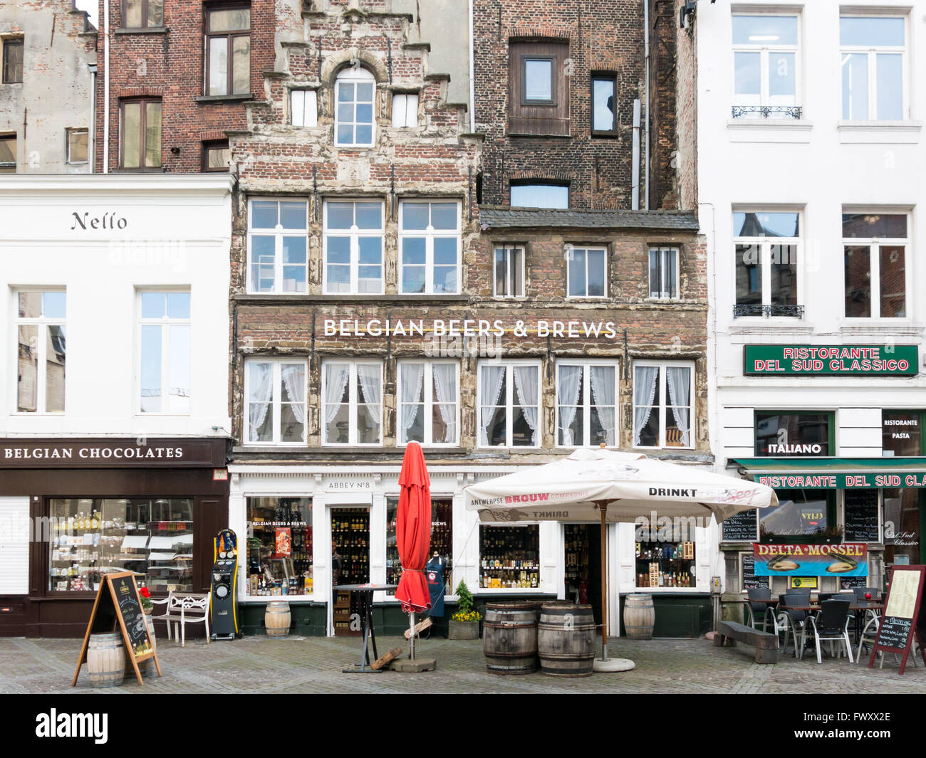 Gift shops in historic houses at Handschoenmarkt in the city centre of Antwerp, Flanders, Belgium Stock Photo