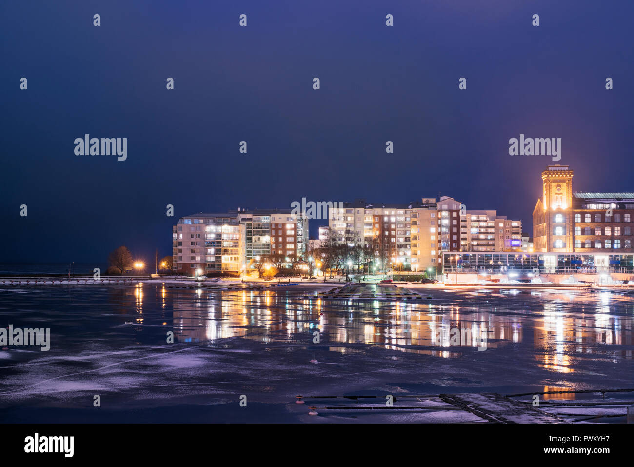 Finland, Pirkanmaa, Tampere, Illuminated cityscape a night Stock Photo