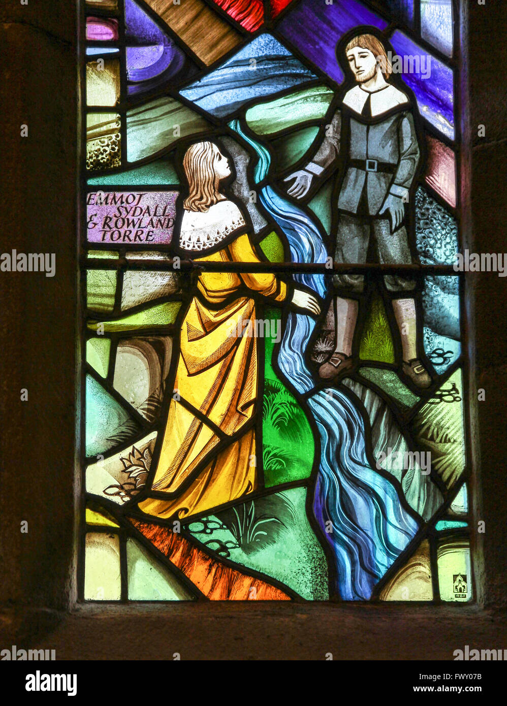 Stained glass window depicting Emmott Sydall and Rowland Torre in St Lawrence’s parish Church Eyam Derbyshire England UK Stock Photo