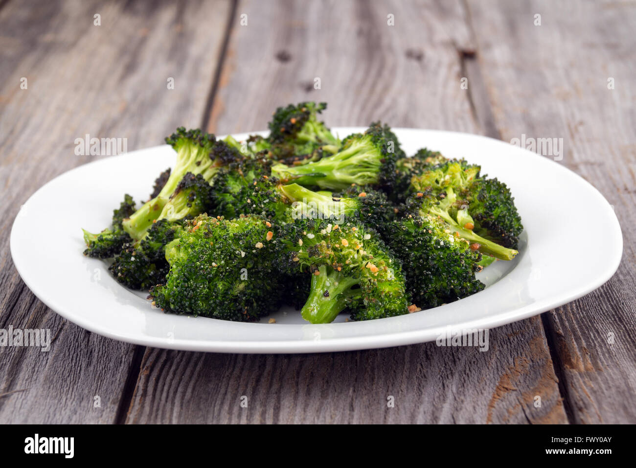 baked roasted garlic parmesan and olive oil broccoli side dish on