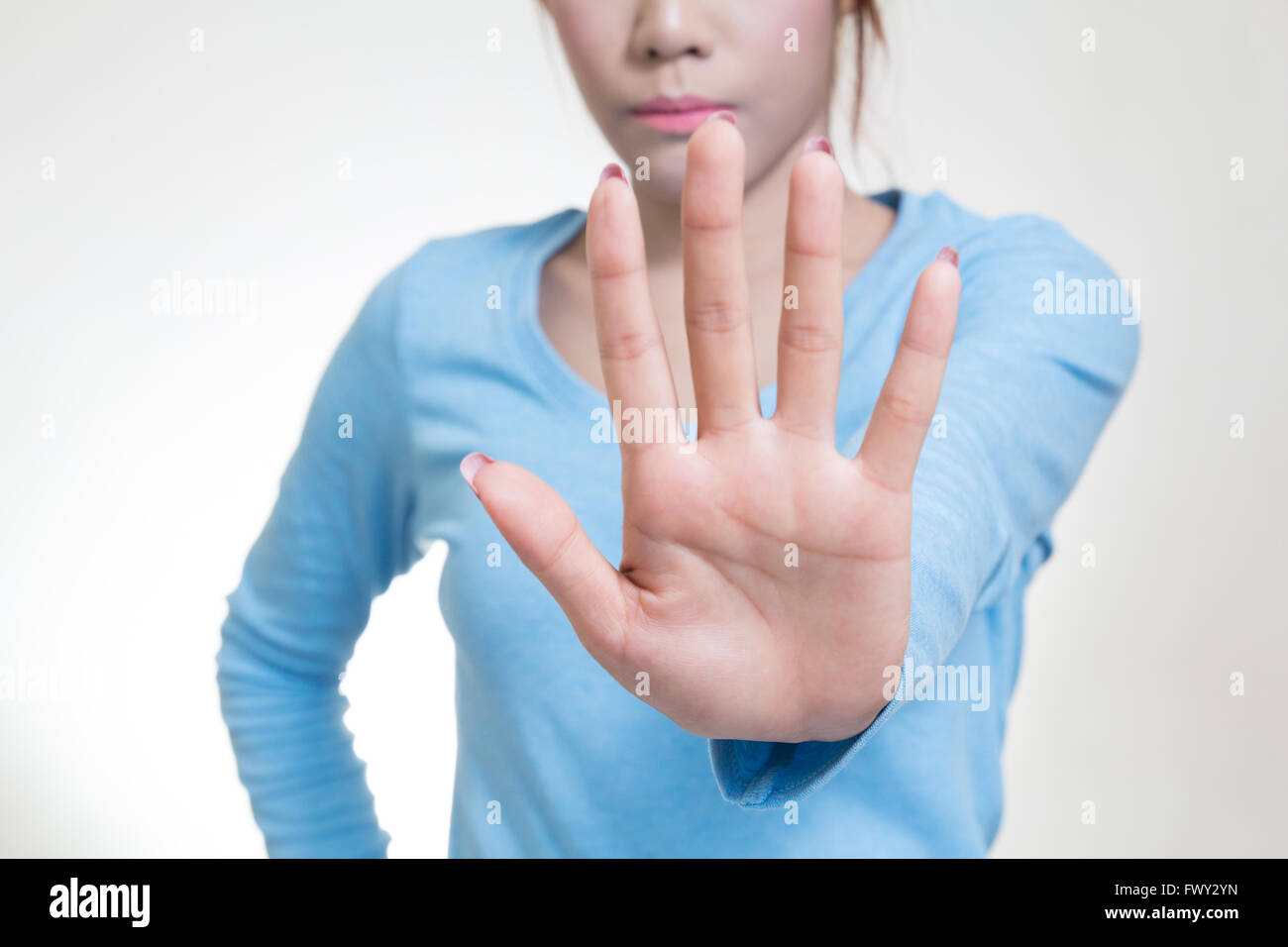 Asian women showing stop hand gesture, selective focus Stock Photo
