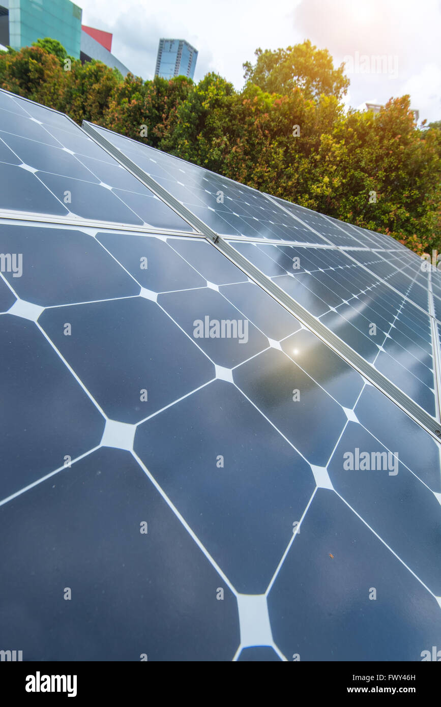 Solar Panels In The Park Of Modern City Stock Photo