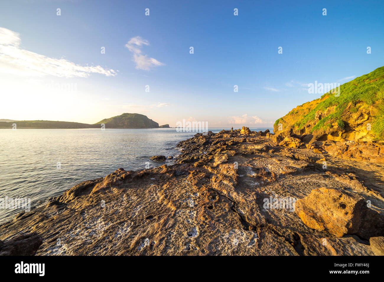 Texture of beach rocks with nature sunlight Stock Photo - Alamy