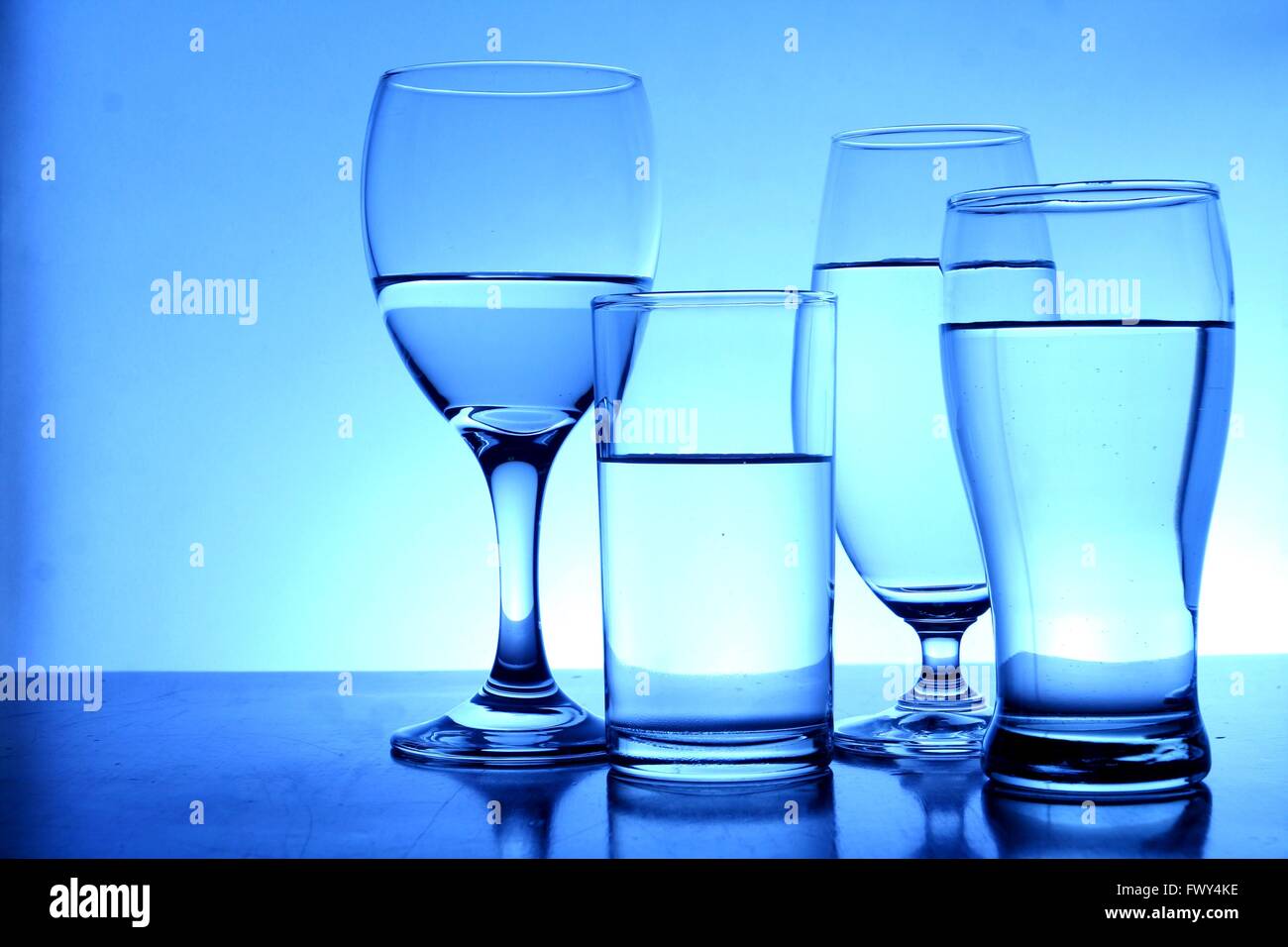 Different glasses of water Stock Photo