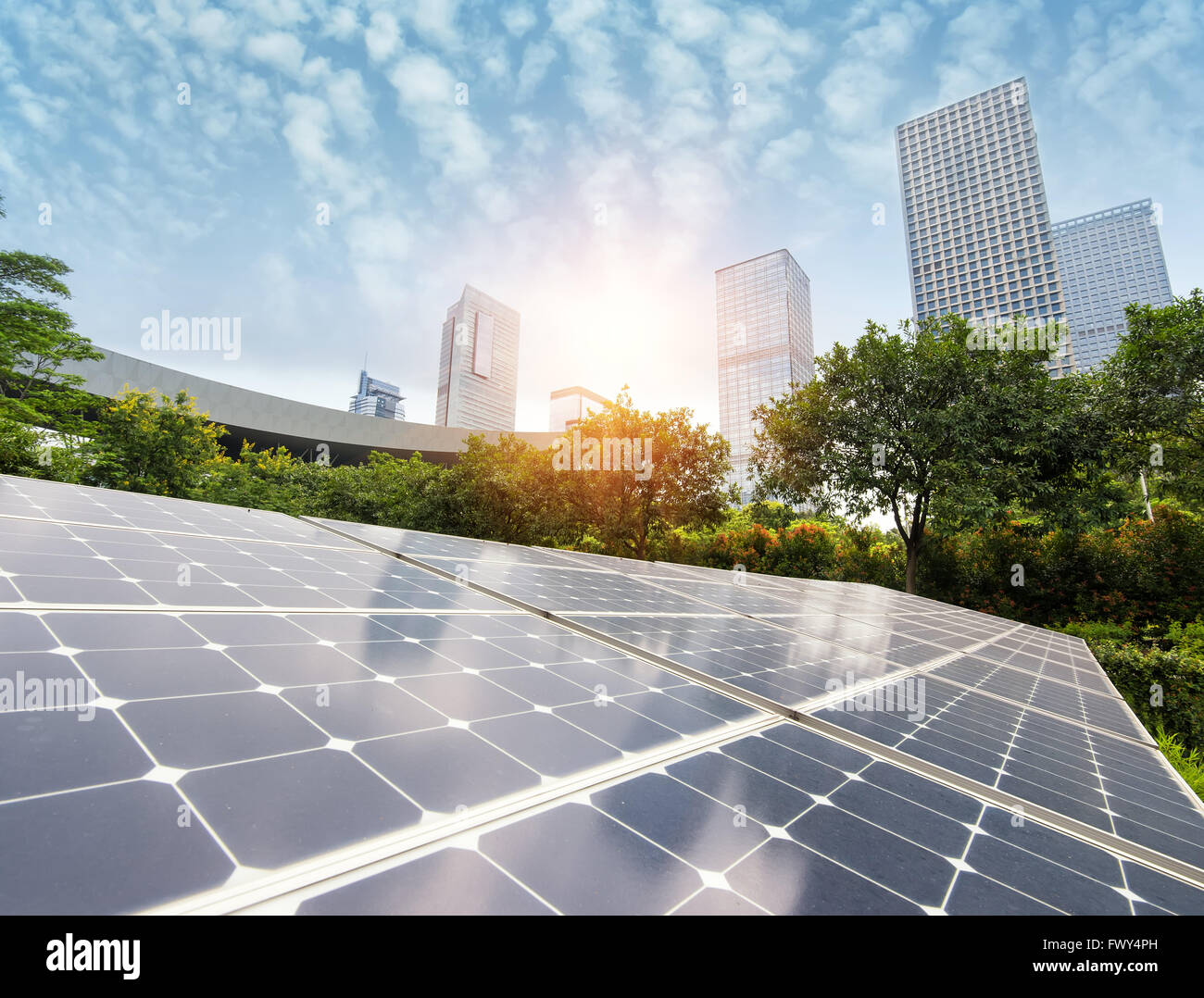 Solar Panels In The Park Of Modern City Stock Photo