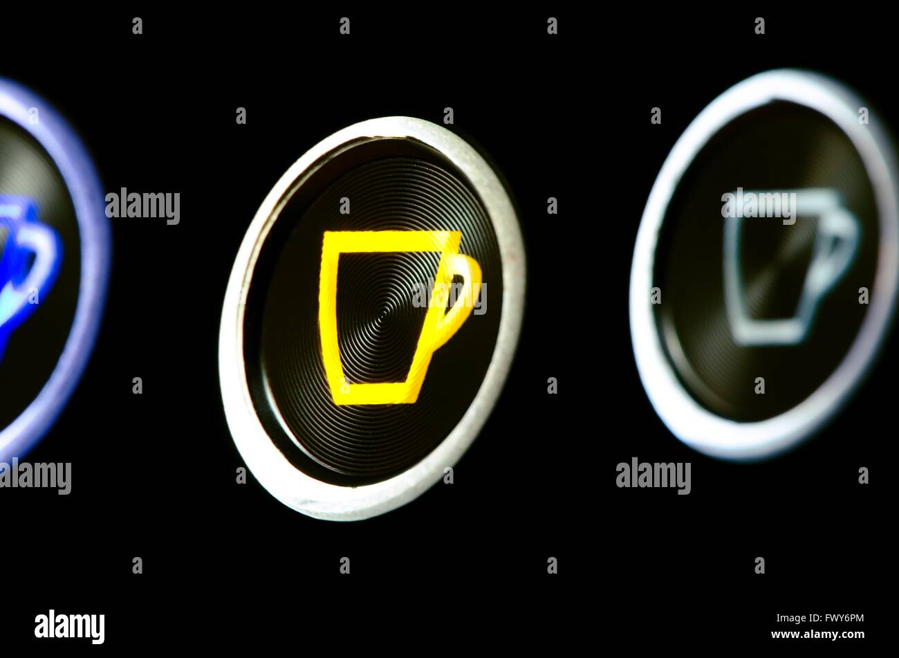 Three colorful coffeemaker buttons, light cup texture Stock Photo