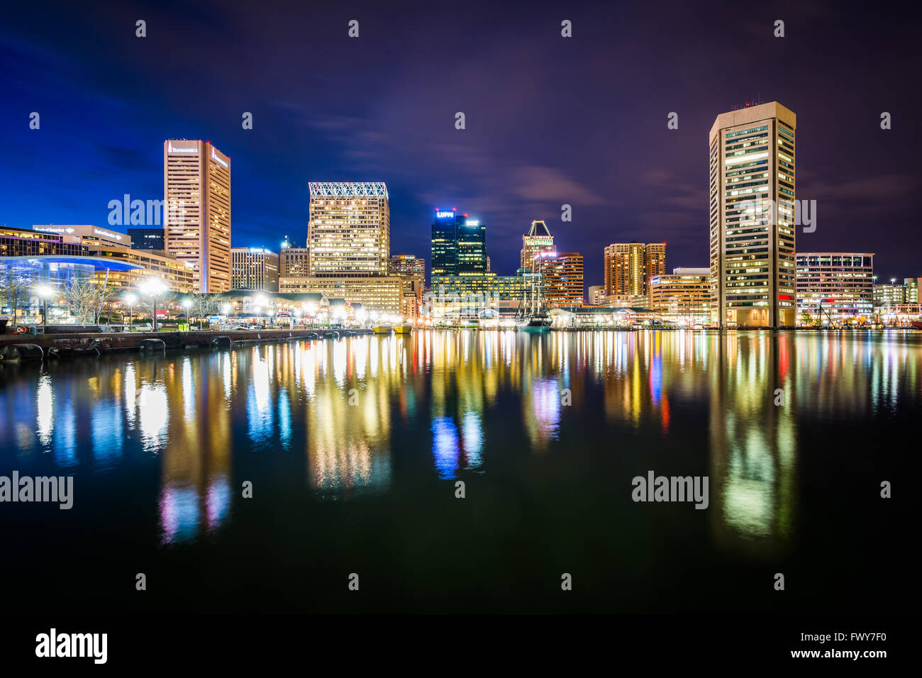 The Inner Harbor skyline at night, in Baltimore, Maryland Stock Photo