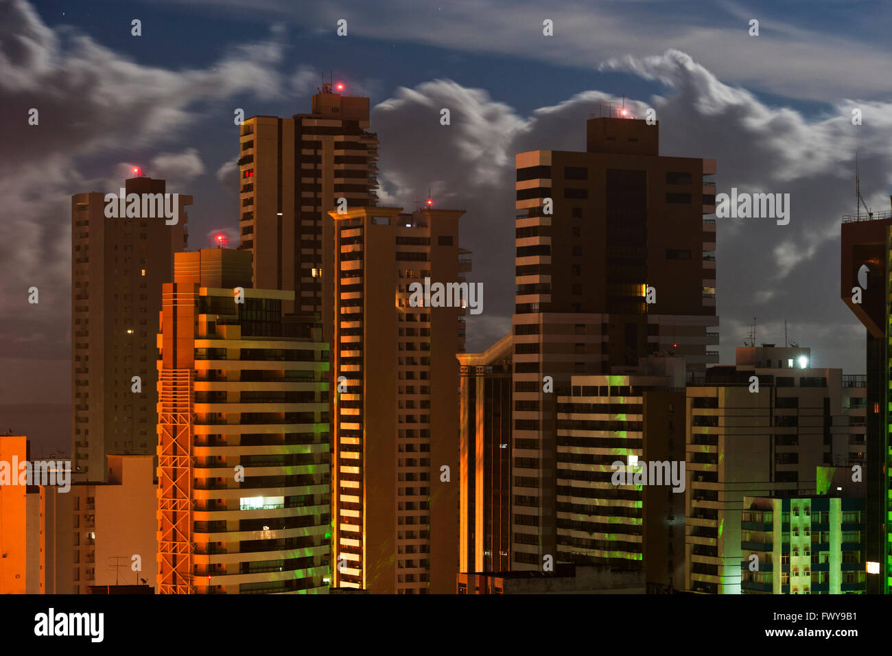 Skyscrapers in the Corredor da Vitória (Corridor of Vitoria) with clouds in the background at night, Vitoria neighborhood, Salvador, Bahia, Brazil Stock Photo