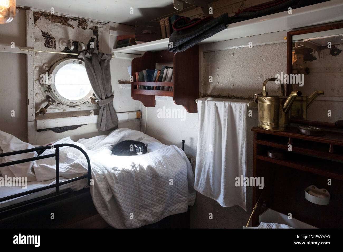 Officer's cabin on board HMS M33 in the Royal Naval Dockyard, Portsmouth. Stock Photo