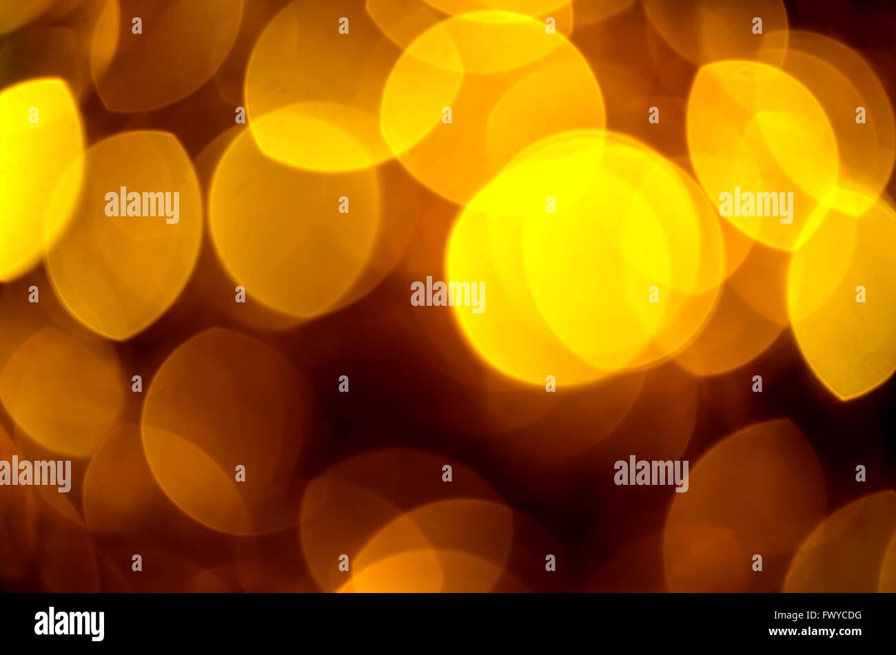 Blur golden circle lights as christmas background Stock Photo - Alamy