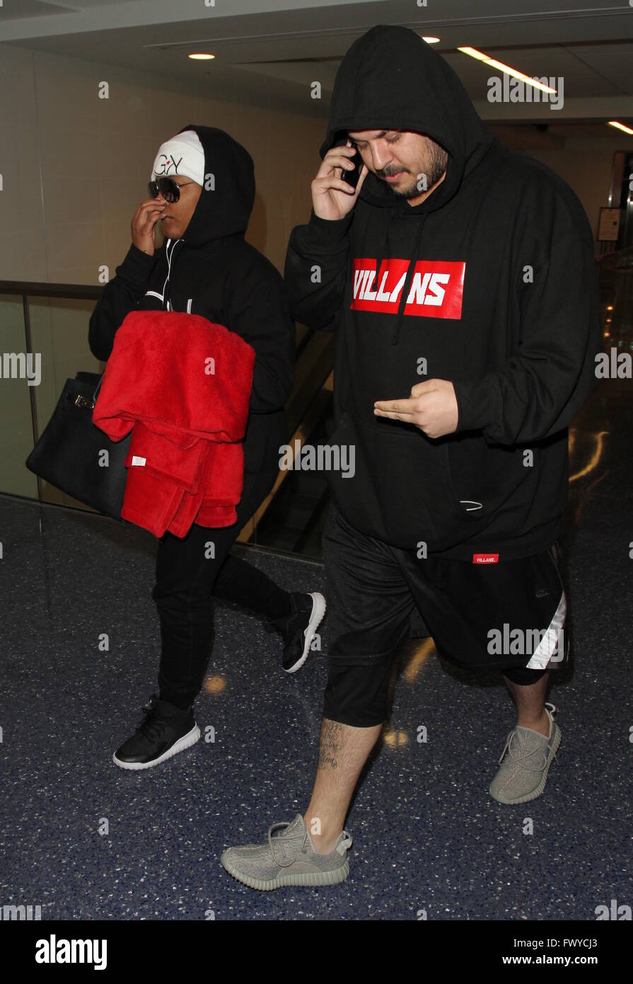 Rob Kardashian arrives at Los Angeles International Airport with
