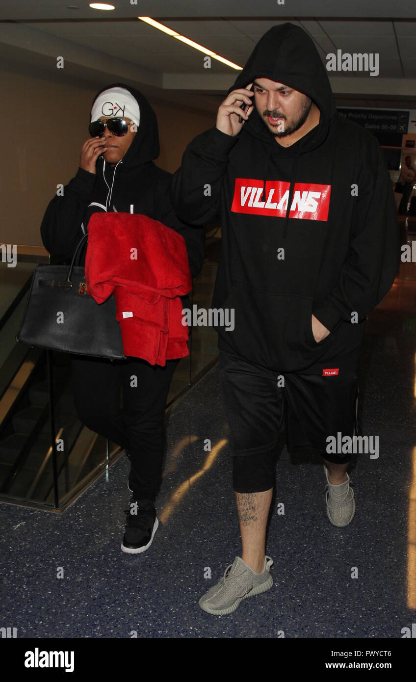 Rob Kardashian arrives at Los Angeles International Airport with