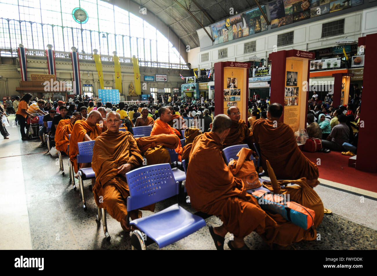 Buddist monks at Bankok train station Stock Photo