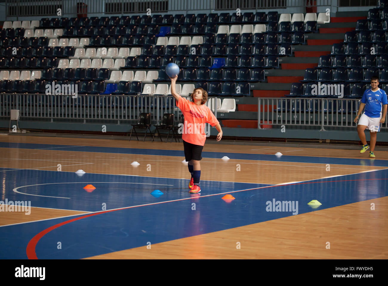 youngsters playing handball in a sports centre Stock Photo Alamy