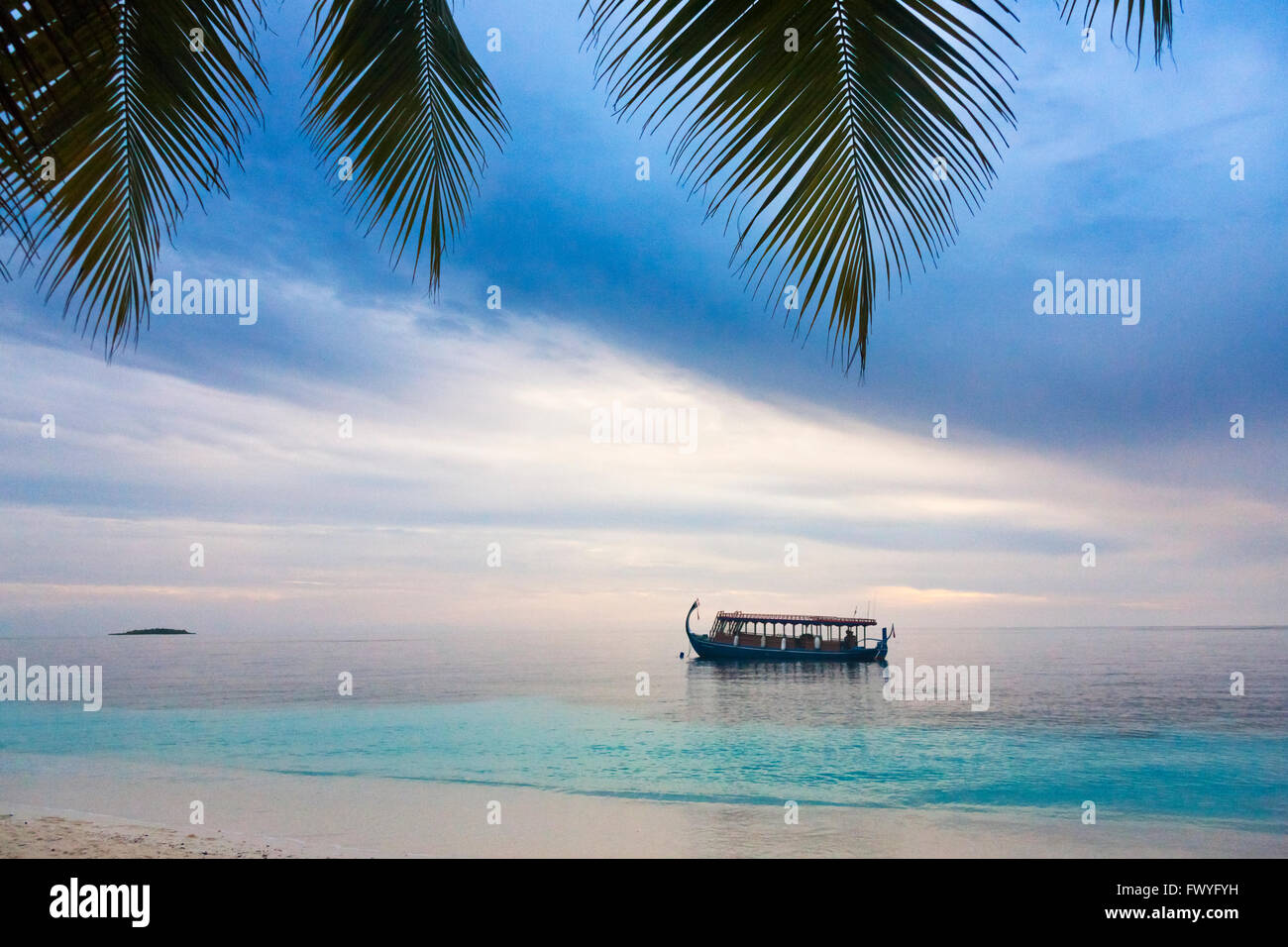 Dhonis, Maldivian boat in the ocean, Maldives Stock Photo