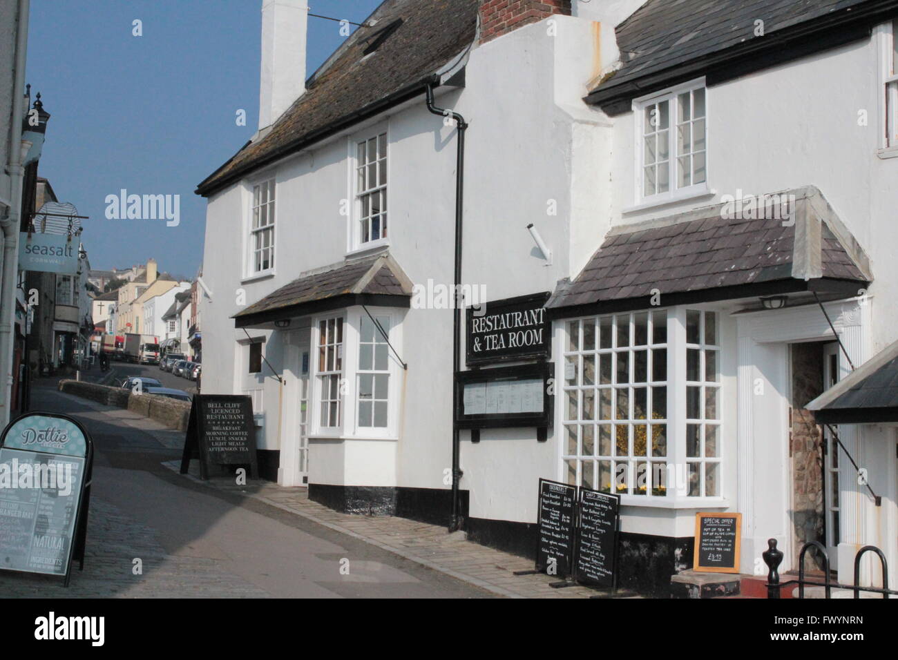 white walled shops and street Stock Photo Alamy