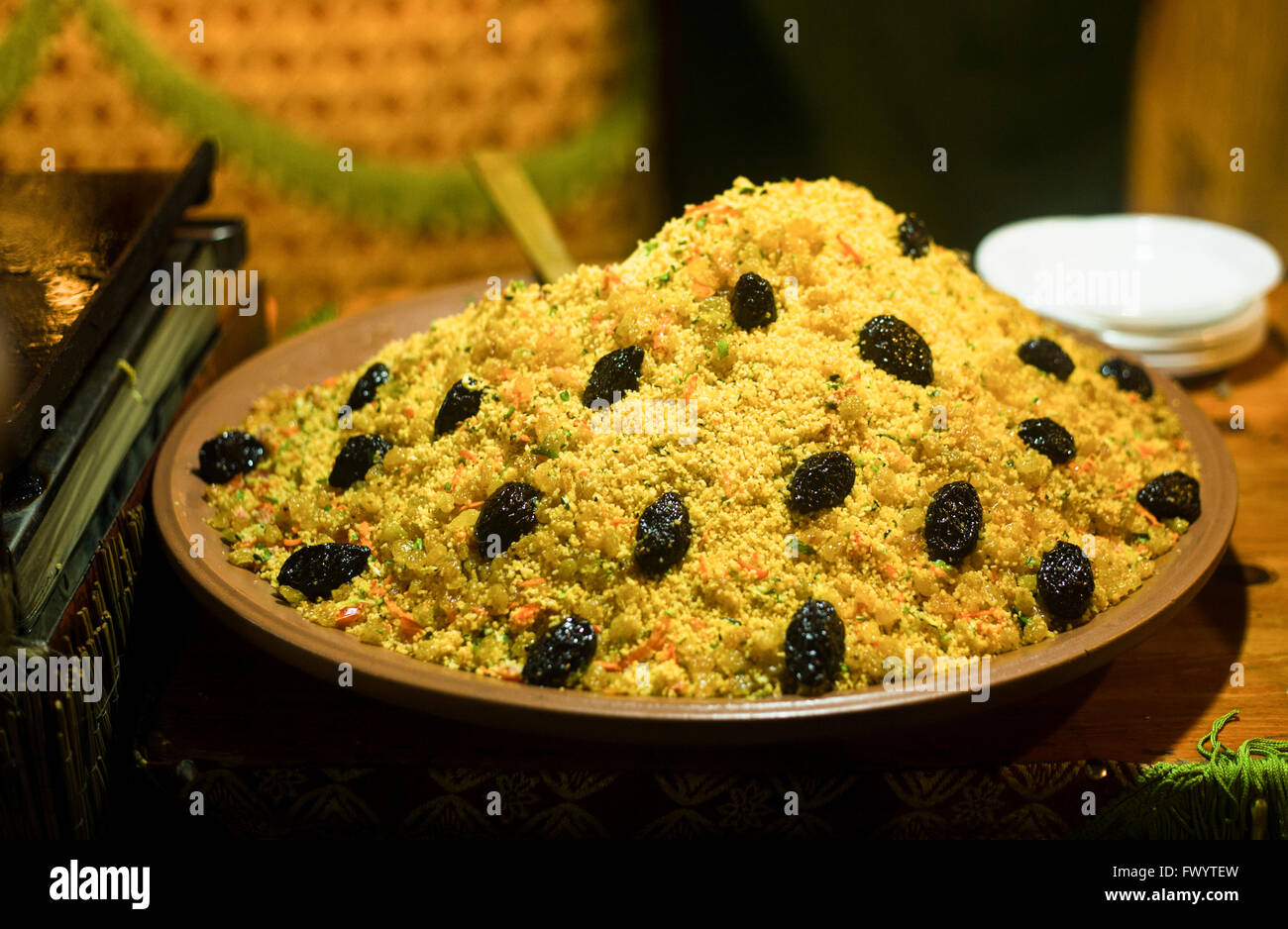 Large bowl of couscous with dried plums Stock Photo Alamy