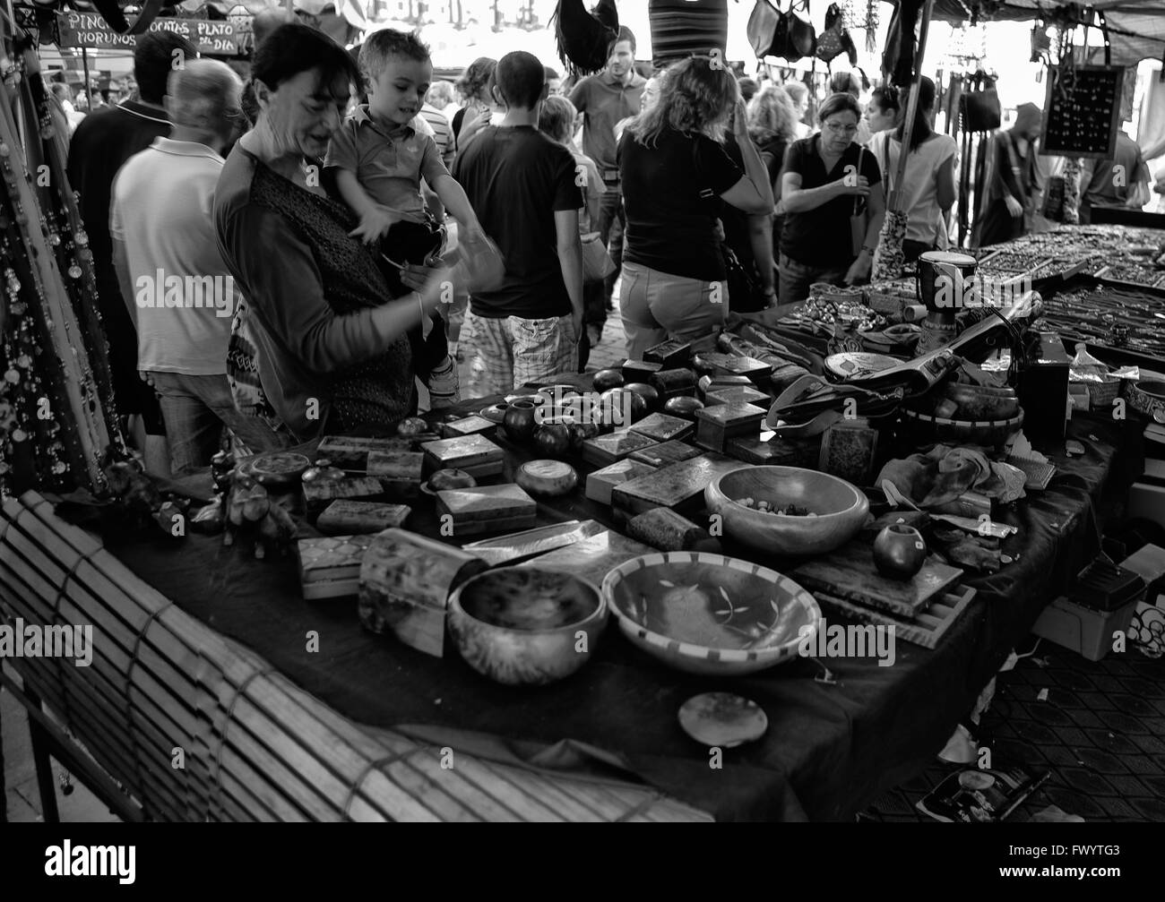BADAJOZ, SPAIN - SEPTEMBER 25: Unidentified costumers close to tents of traditional arabic pottery at the Almossasa Culture Fest Stock Photo