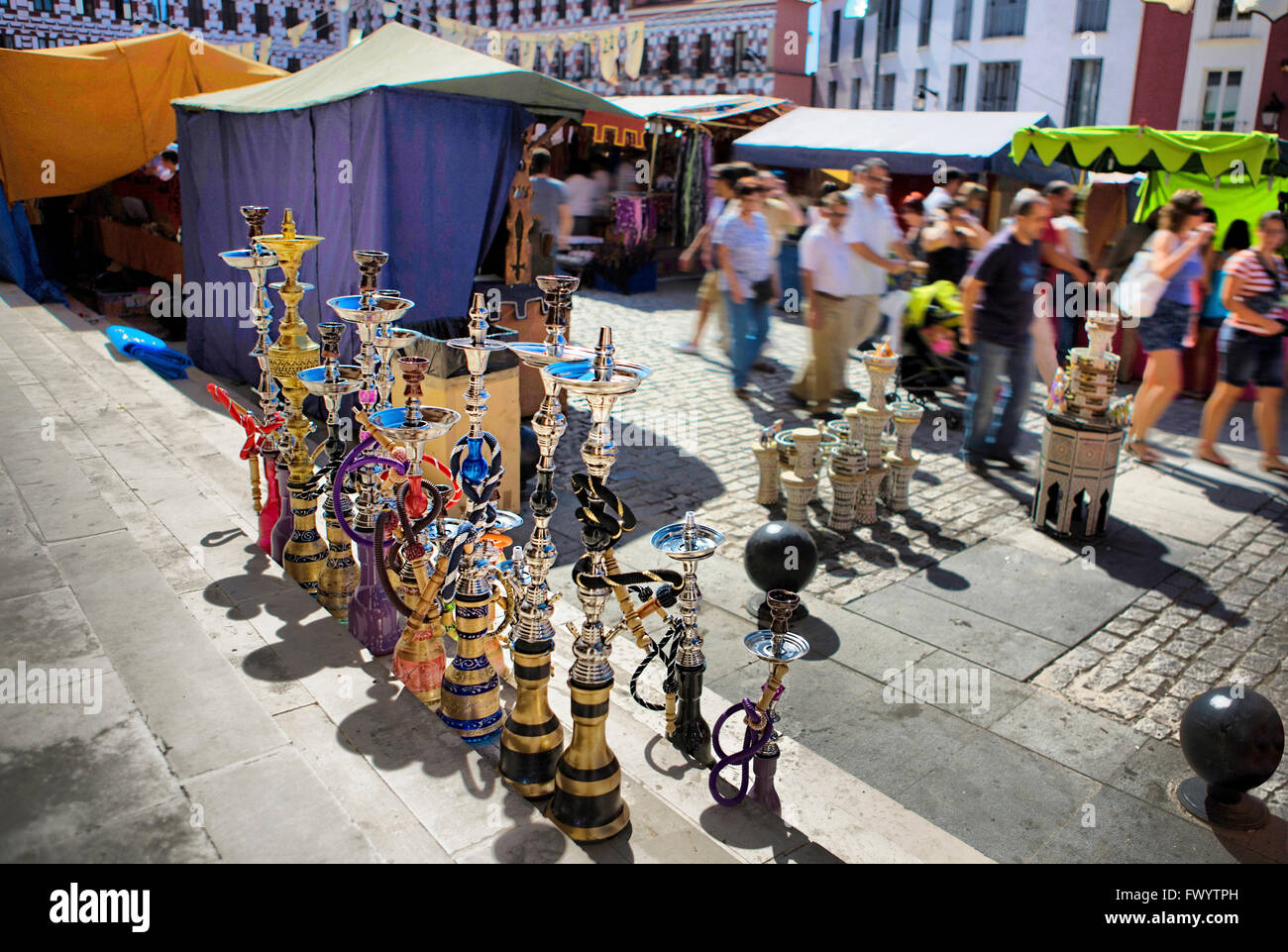 BADAJOZ, SPAIN - SEPTEMBER 25: Unidentified costumers close to tents of traditional arabic pottery at the Almossasa Culture Fest Stock Photo