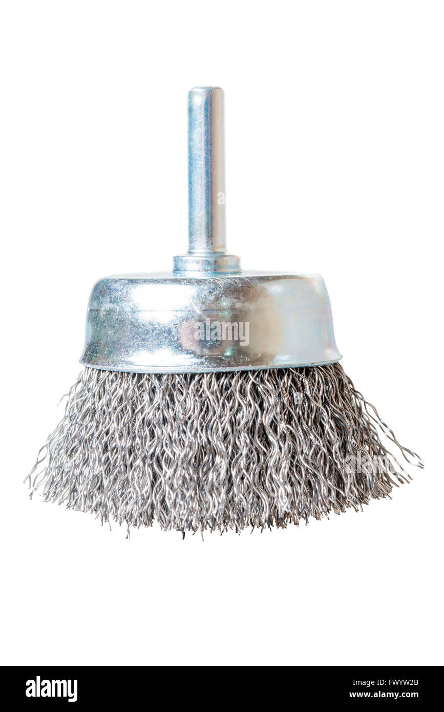 attachment on a drill for cleaning the surface from rust close up isolated Stock Photo