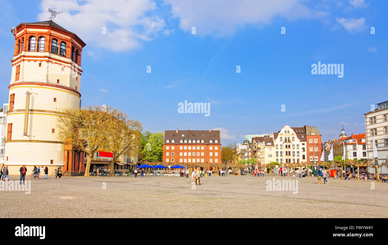 DUSSELDORF, GERMANY - MAY 3, 2013: Schiffahrtmuseum Schlossturm in the city center of Dusseldorf. Tourists nearby Stock Photo